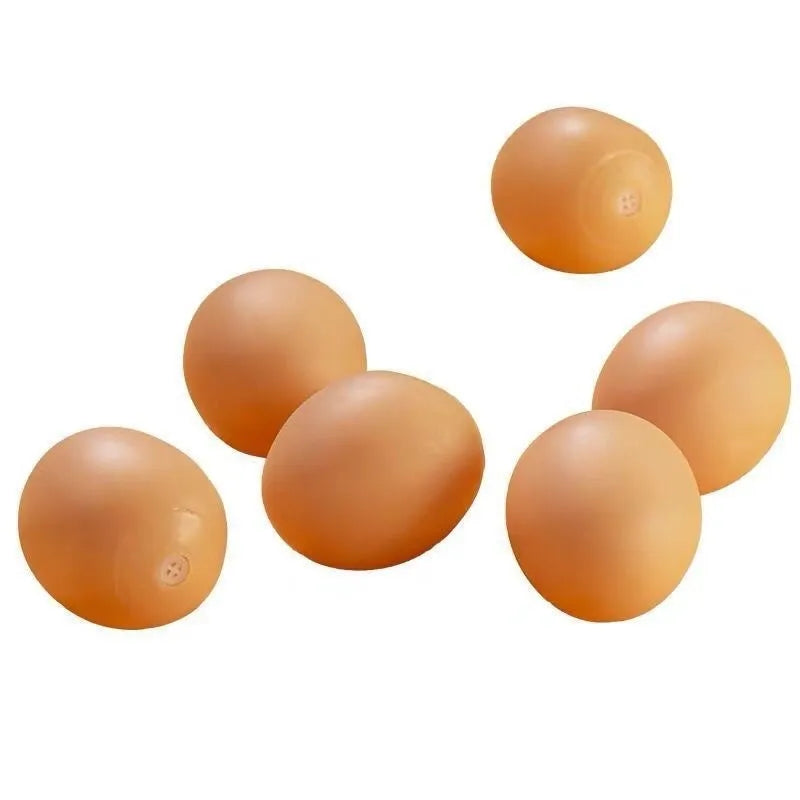 Simulation egg dog toy with sound in assorted colour, rounded plastic design for chewing and fetch play