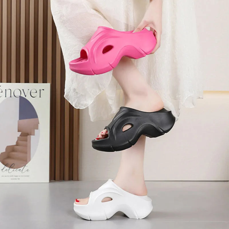 Women's thick-soled EVA slippers in rose red colour with round toe.