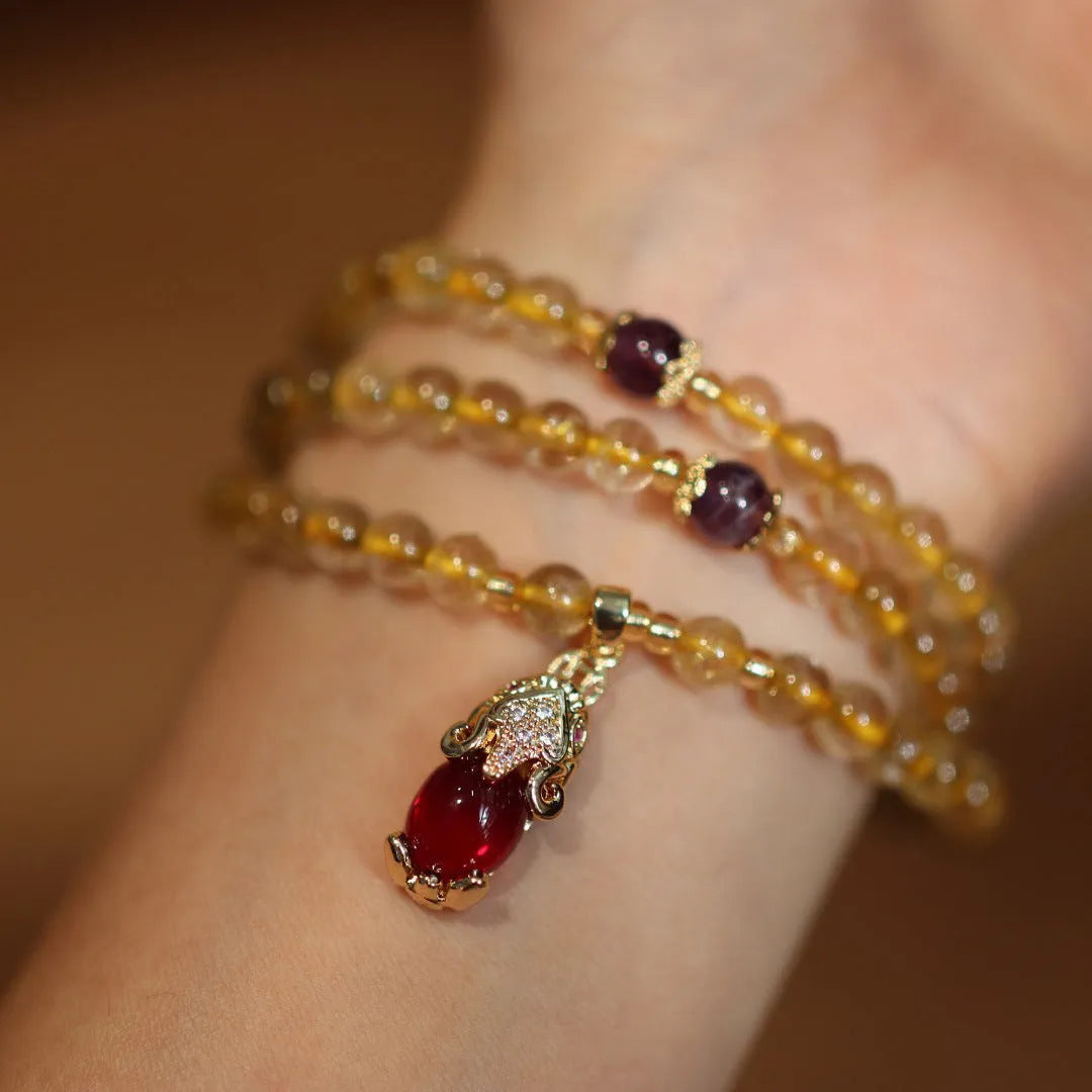 Natural Brazil gold rutilated quartz bracelet with three gold circles and ruby quartz hanging chopsticks charm