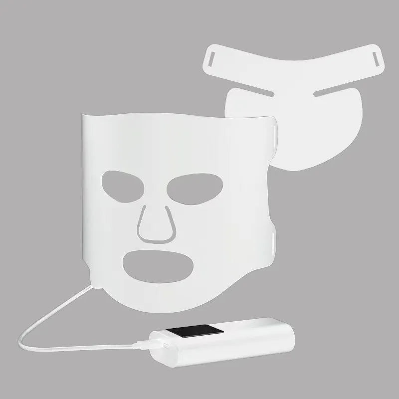 Black and white LED phototherapy face mask with controller, showing seven coloured light modes for skin treatment.