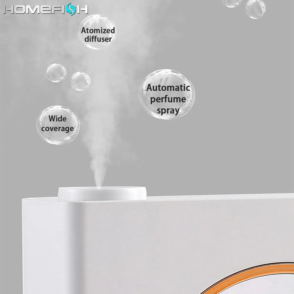 Small white automatic aromatherapy machine mounted on wall with USB charging cable