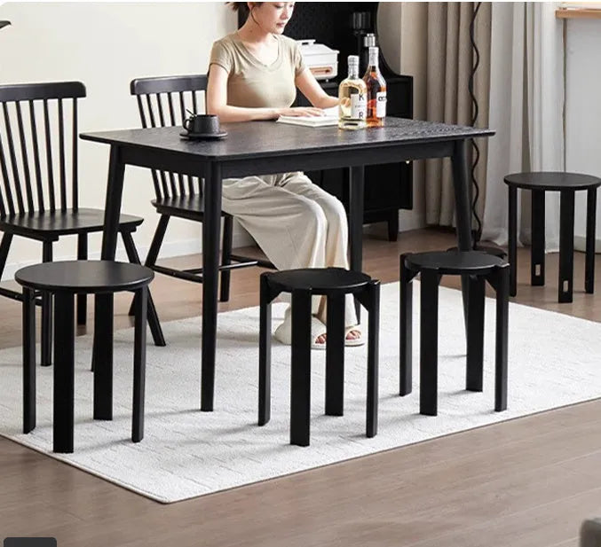 Stackable round metal dining stool in modern design with four colour options