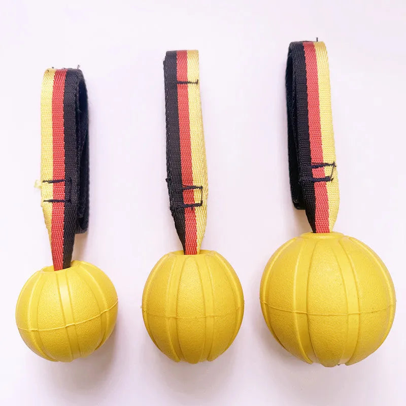 EVA floating tetherball dog toy in camouflage and yellow colours showing three diameter sizes