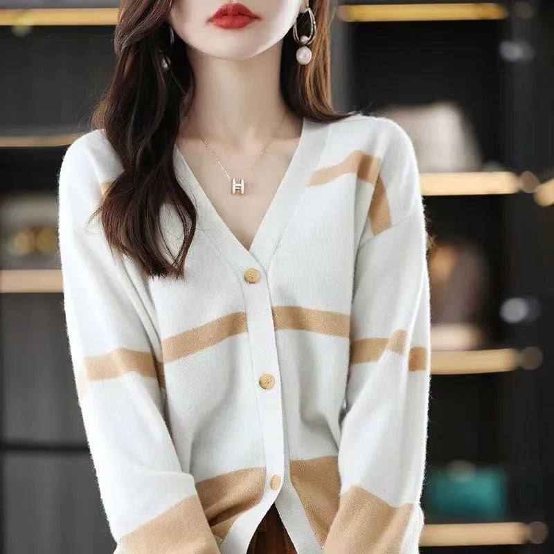 Women's striped V-neck knitted cardigan in a slim fit, showing 3D pattern detail.
