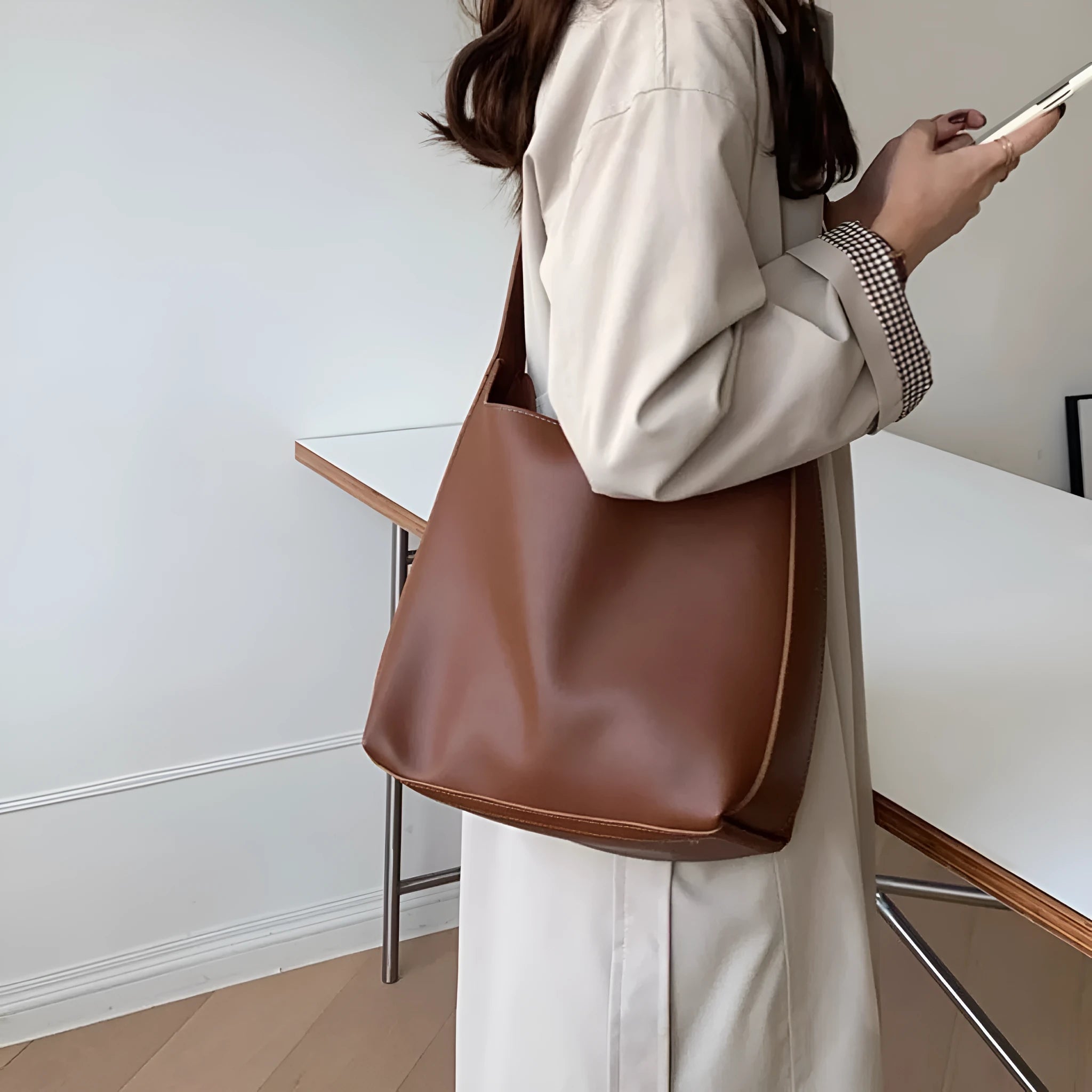 Women's soft PU leather shoulder bag with swinging thread decoration in 28x32x12cm size