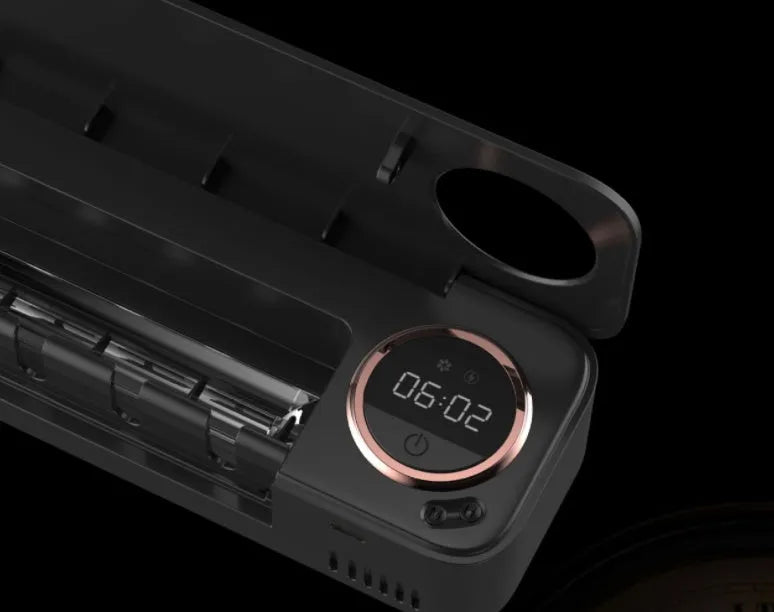 UV toothbrush holder sterilizer with LED display, black, wall-mounted with toothbrush inside