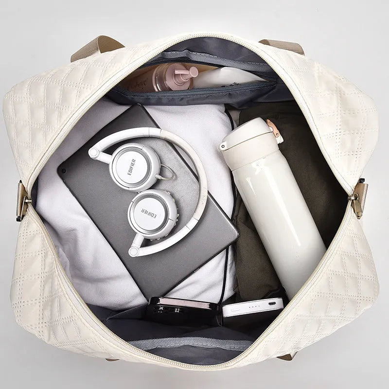 Portable Oxford cloth travel bag in street trend style with large 55L capacity.