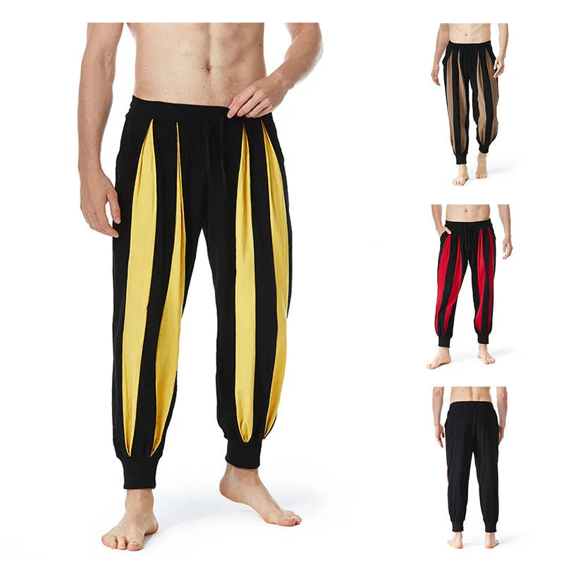 Man wearing straight-leg casual trousers in one of four available colours: brown, khaki, red, or yellow.