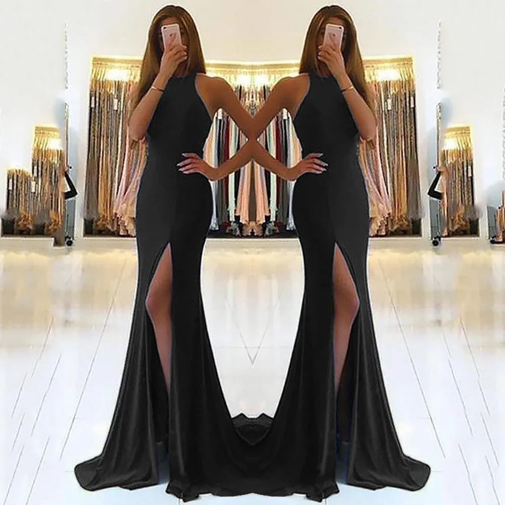 Long red knitted evening dress with hollow detail, hanging neckline, high waist, and a large swing skirt.