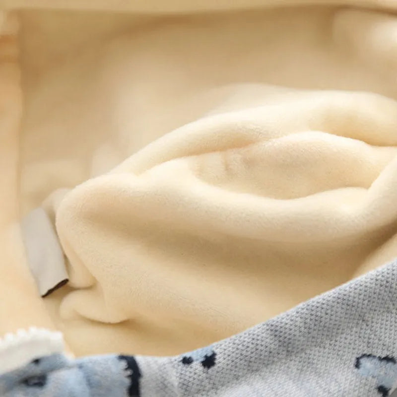 Blue cotton dog pattern sweater zipper coat on a small dog lying down