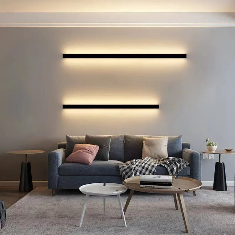 80 cm long black aluminium LED wall lamp with touch control for three light colours on a plain wall