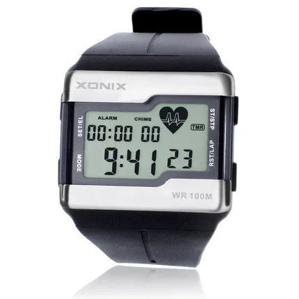 Men's waterproof digital sports watch with square dial, luminous display, heart rate monitor, black resin strap, and rubber case on wrist
