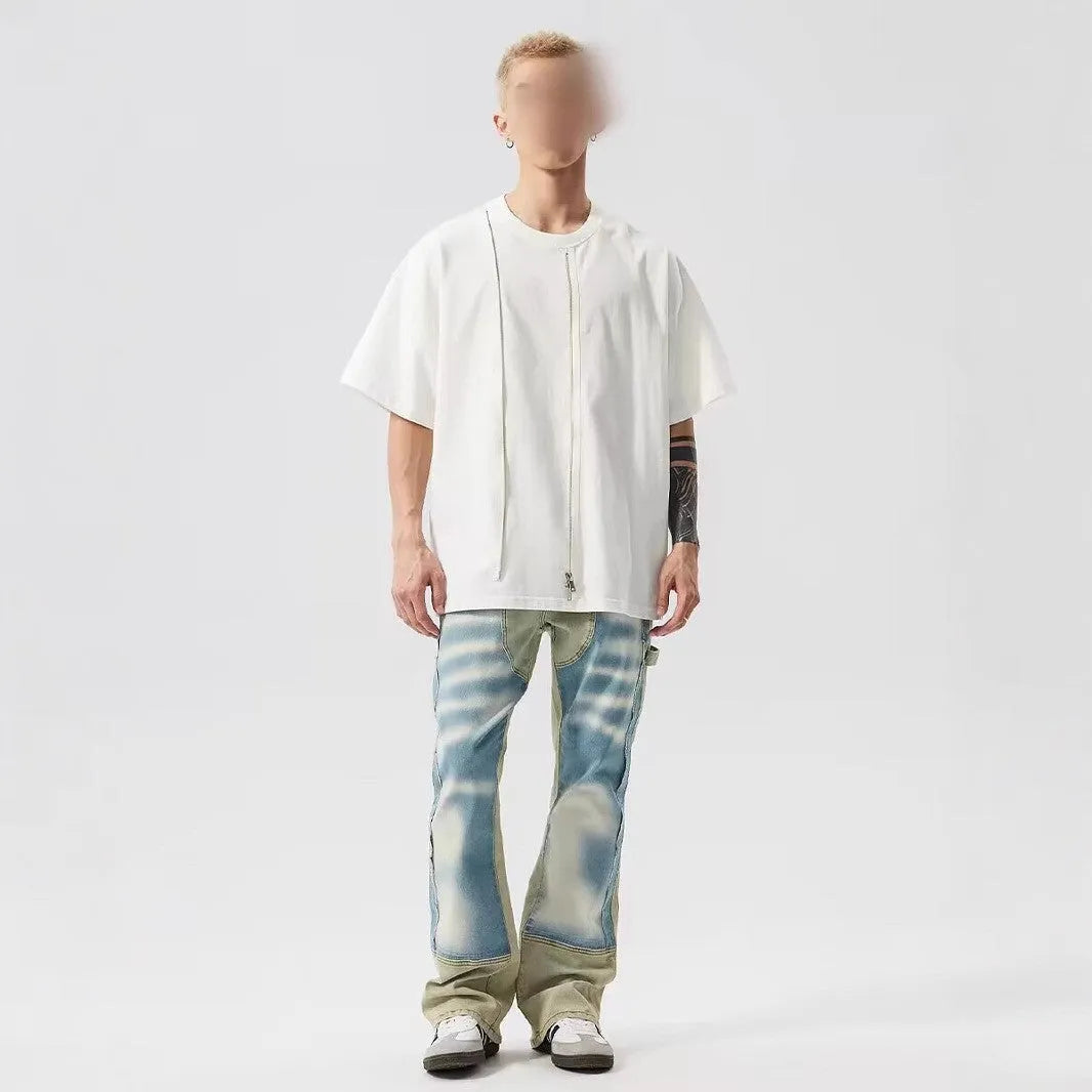 Retro yellow and blue patchwork jeans with splash-ink damaged design detail