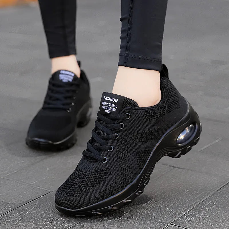 Women's red and black mesh sneakers with round toe and front lace-up design showing 3-5cm mid heel