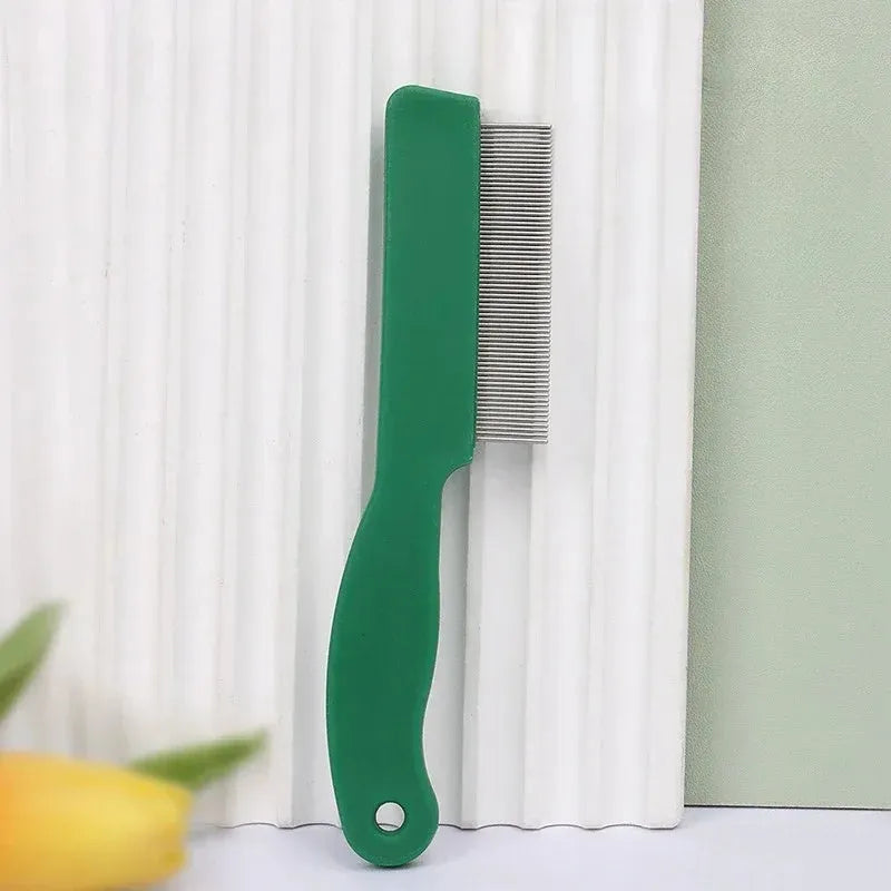 Green plastic handle stainless steel pet flea comb for dogs and cats on white background
