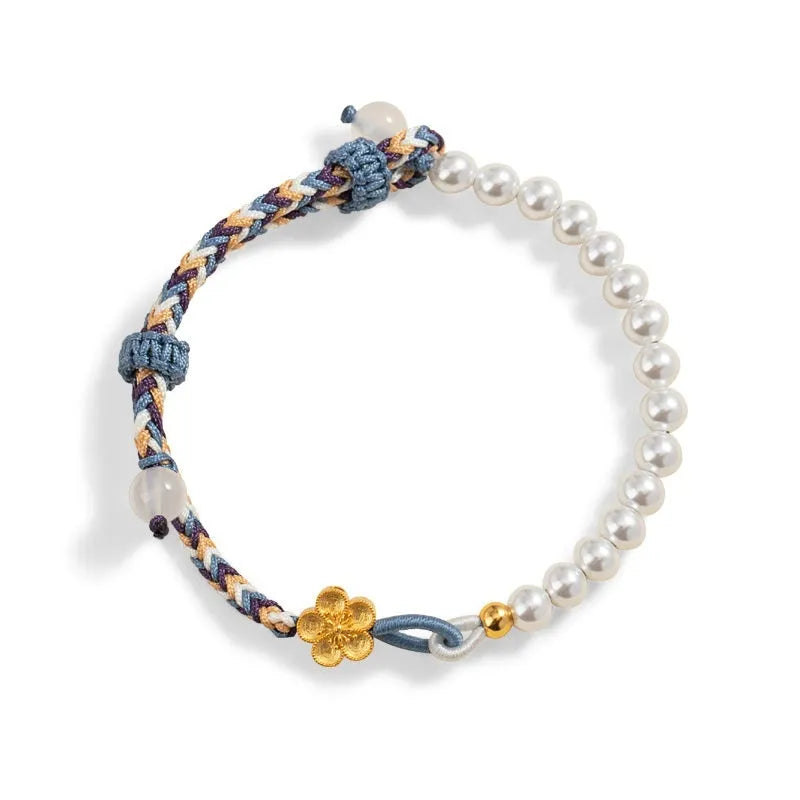 Colorful electroplated cord carrying strap with pearls and flowers and a sterling silver chalcedony charm