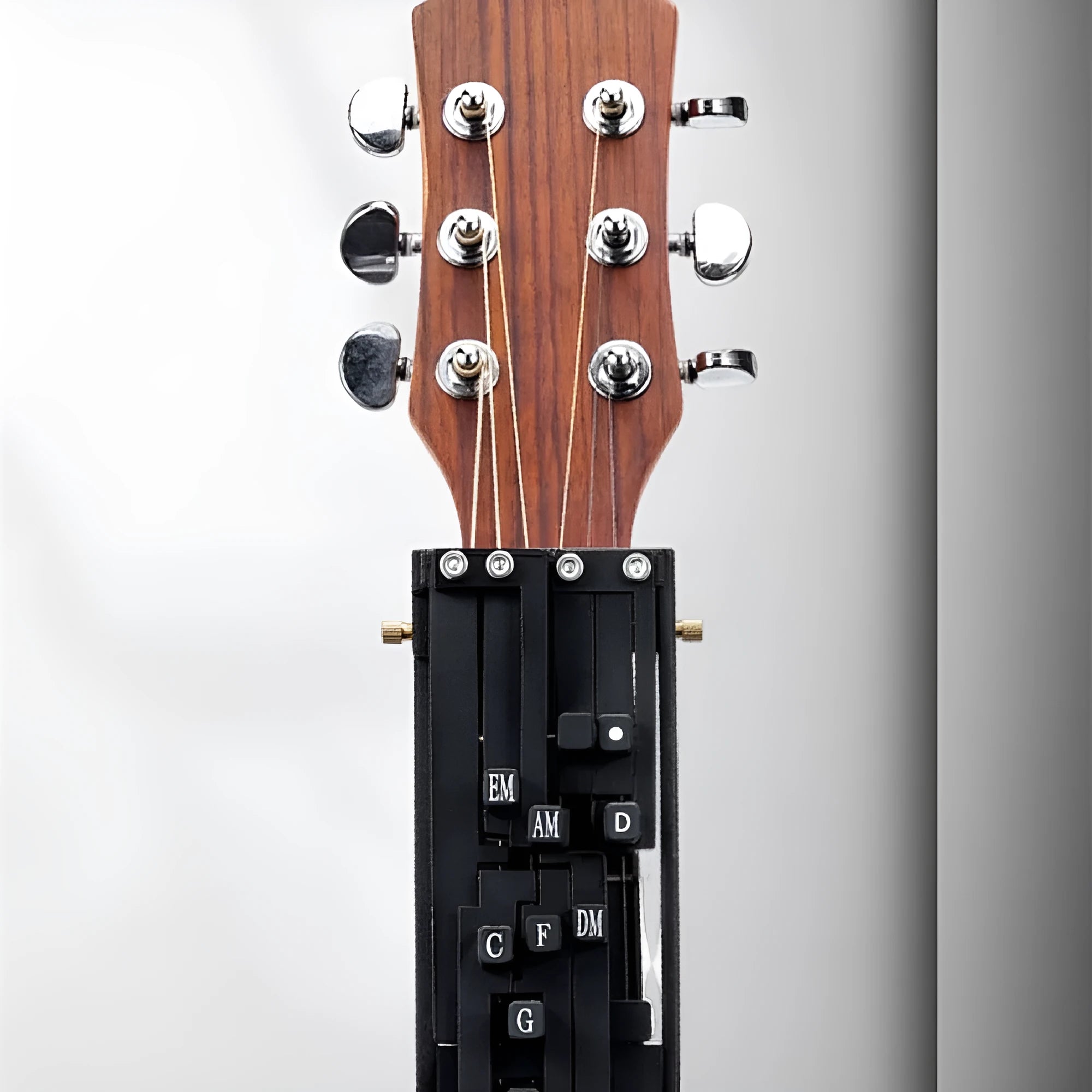 Black automatic chord device for guitar practice with singing assistance