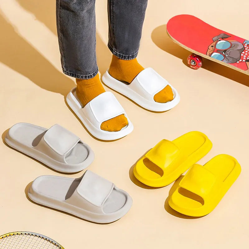 Pair of thick-soled EVA flip-flop slippers in a chosen colour, showing the non-slip patterned sole.