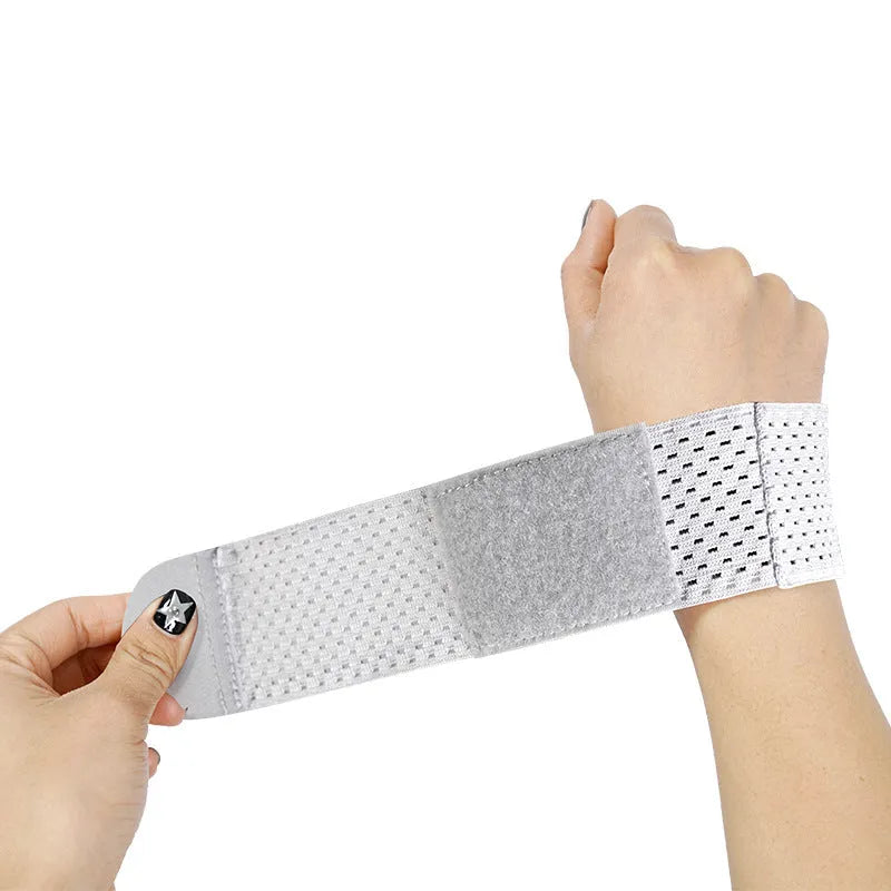 High elastic breathable athletic wristguard in black, gray, or pink, shown as a protective wristband.