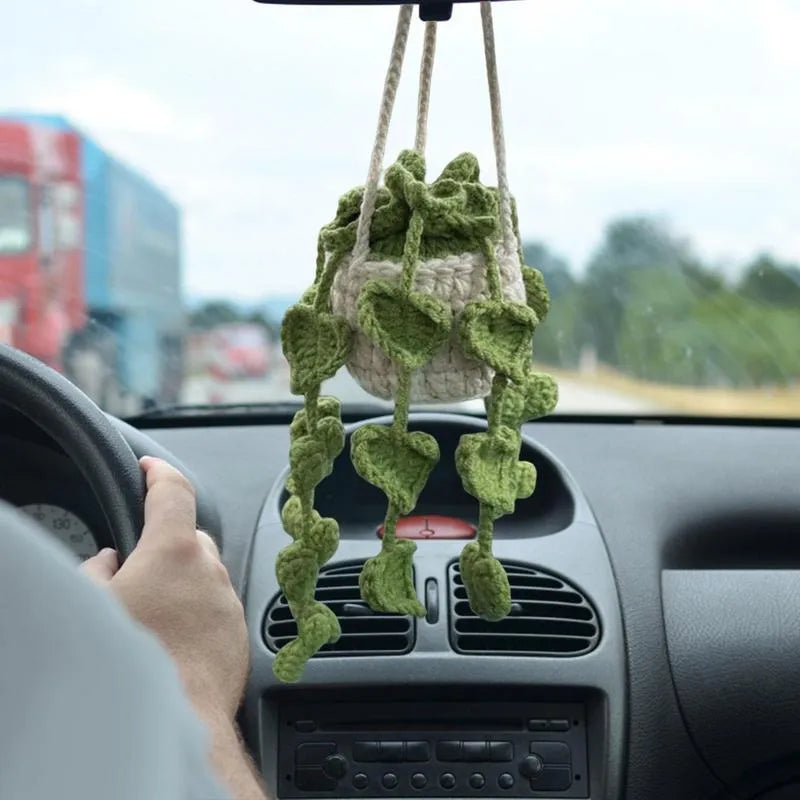 Green and white knitted wool car plant decoration with 25cm hanging rope on car dashboard