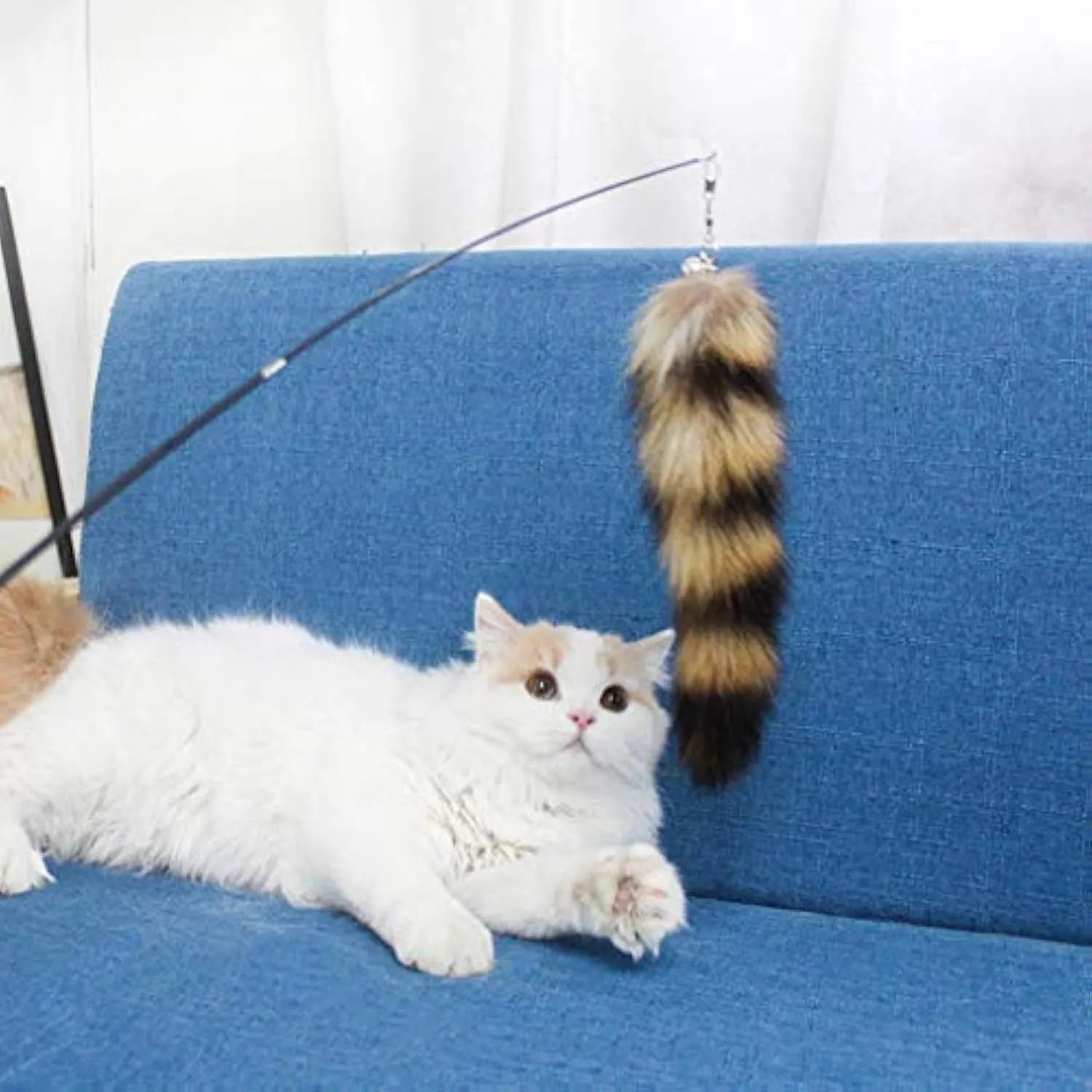 Black cat toy wand with feather teaser on elastic string, 42 cm long