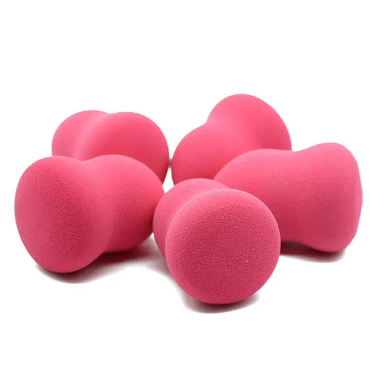 Pink hydrophilic makeup foundation sponge measuring 4cm by 4cm by 5.6cm for wet and dry application
