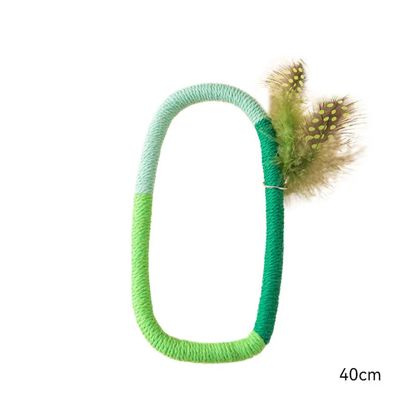 Green circular cotton rope cat toy with feathers and catnip for interactive play