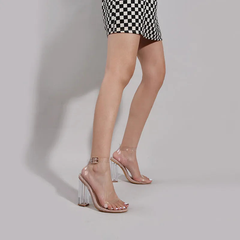 Apricot women's high heel sandals with glass heels, a round toe, and a buckle fastening.