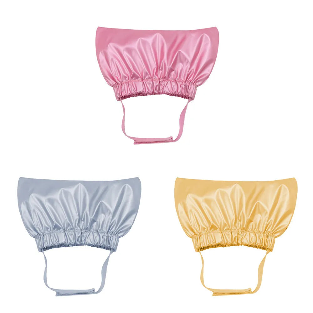 Adjustable waterproof pet shower cap for cats and dogs in silver colour showing ear protection design