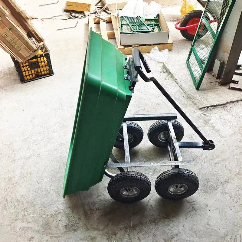 Green four-wheel plastic dump truck with steel frame and tipping bed for agricultural use.
