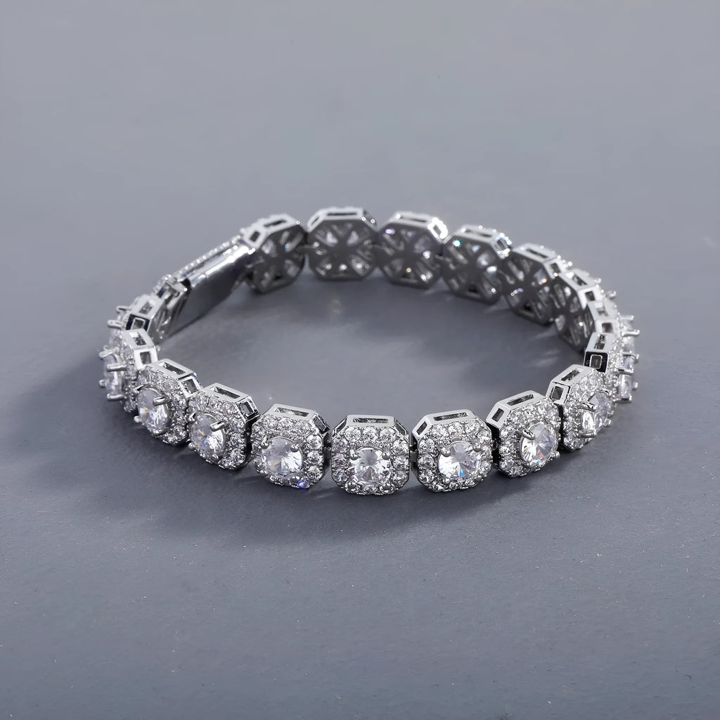 Men's silver zircon flip Cuban chain bracelet on wrist showing inlaid zircon and clasp detail
