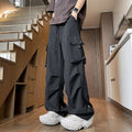 Plus size loose straight-leg waterproof trousers in black, available in sizes M to 5XL.