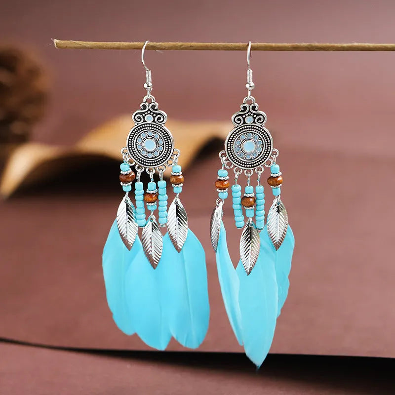 Round drop feather earrings in alloy with leaf shape and Bohemian patterning