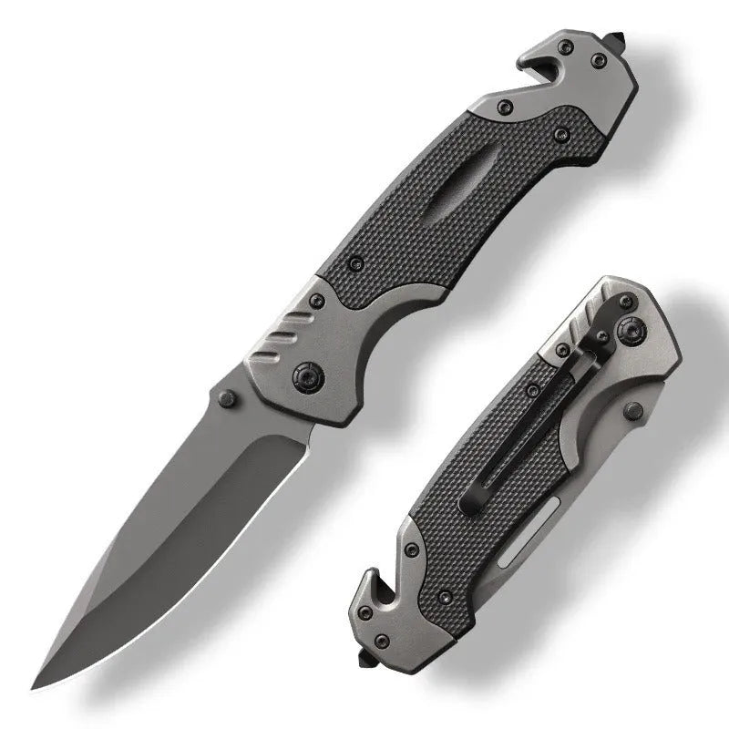 Portable folding knife with alloy blade, 225mm full length, on outdoor surface