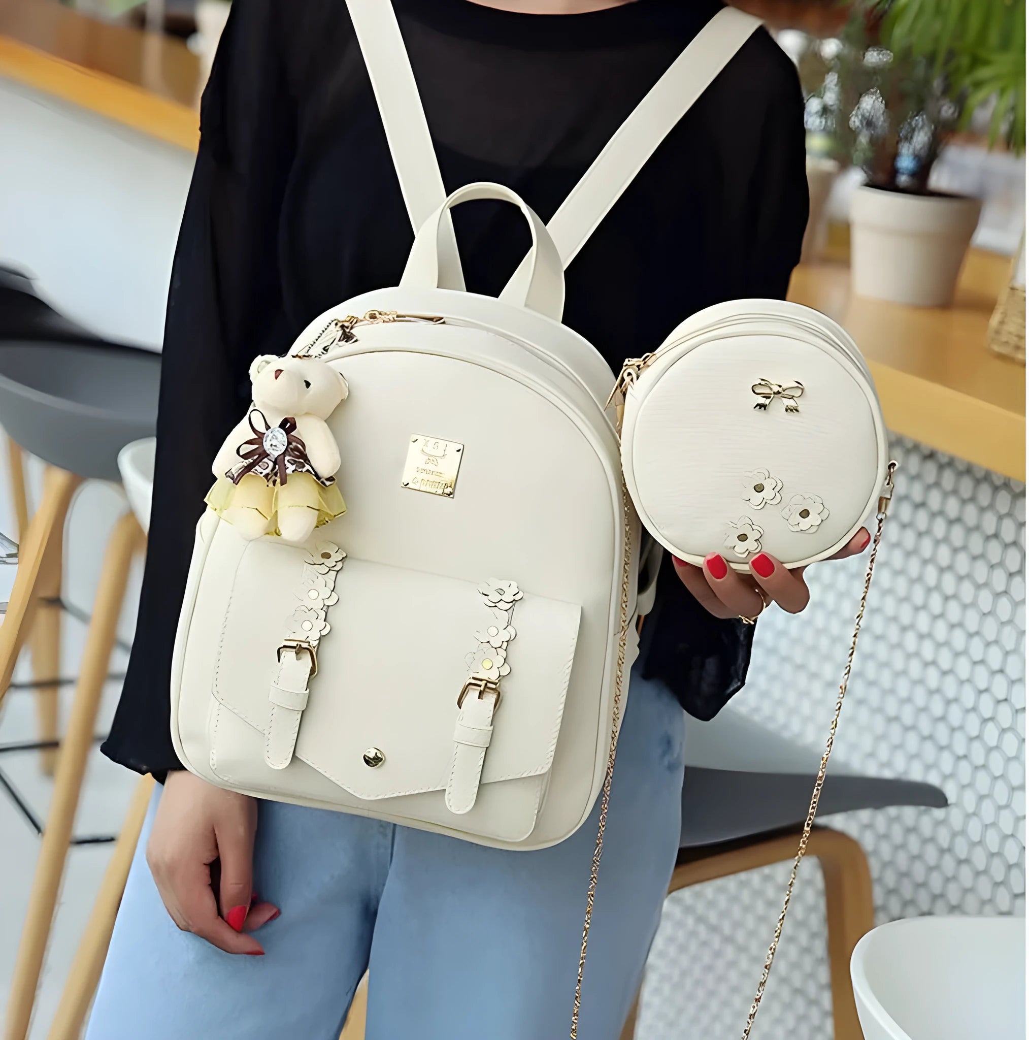 Black pu leather 3-piece bag set showing backpack, crossbody shoulder bag, and card purse.