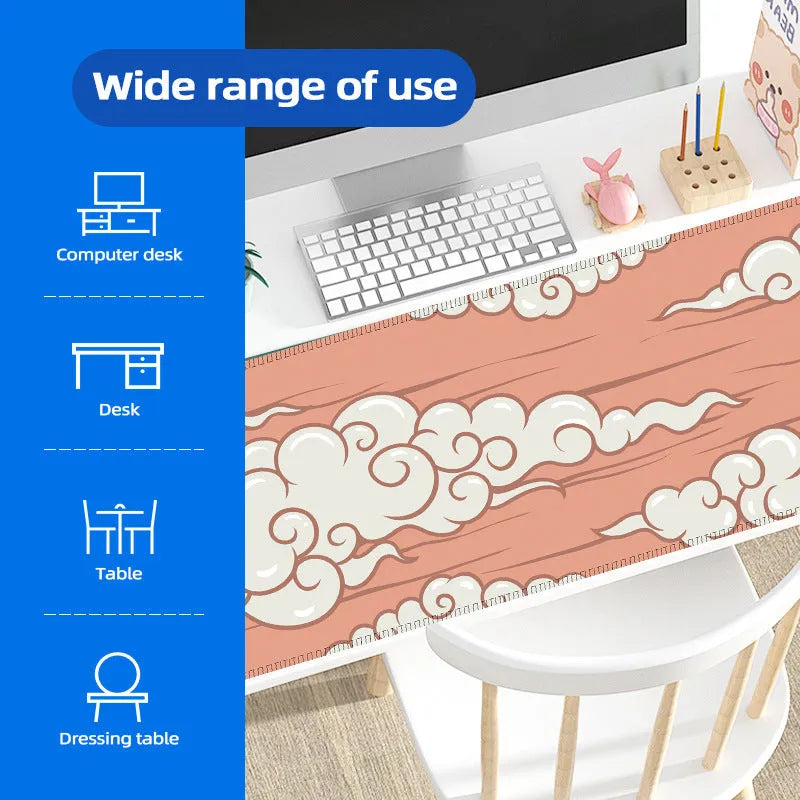 Large cloud pattern rubber desk mat and mouse pad on a wooden desk