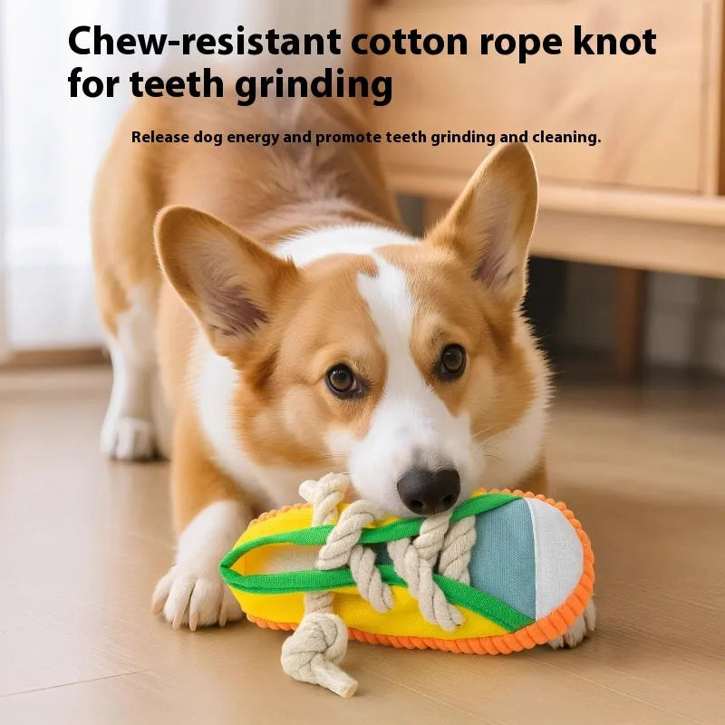 Plastic dog chew toy shaped like a slipper in yellow, black, and blue colour options.