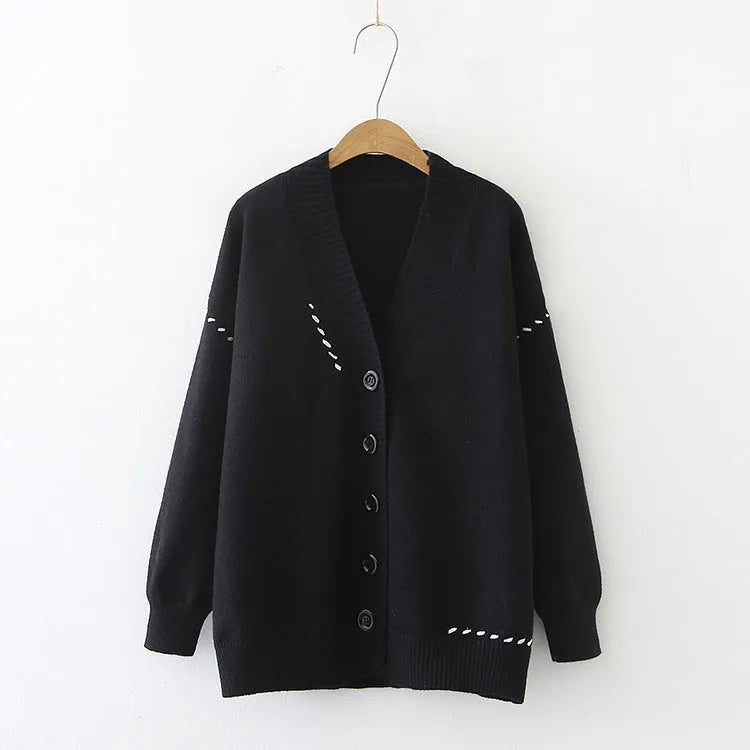 Women's loose fit knitted cardigan coat in solid black colour with long sleeves