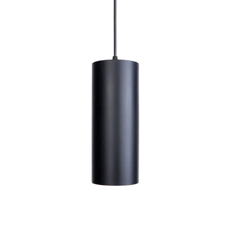 Retro iron art chandelier with matte black finish shown in bedroom setting