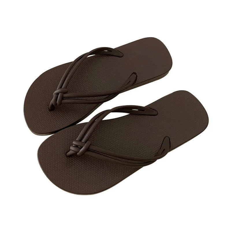 PVC casual flip flops in a toe-covering style on a plain background, showing the one-piece moulded construction.