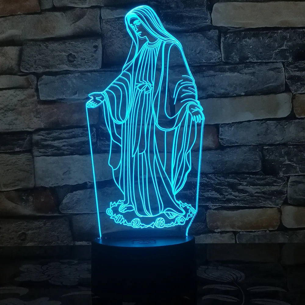3D LED kids night light with colourful ring pattern, USB cable, and touch-sensitive base on a table.