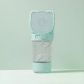 Green, pink, or white 3-in-1 portable pet water bottle with food container and waste bag dispenser.