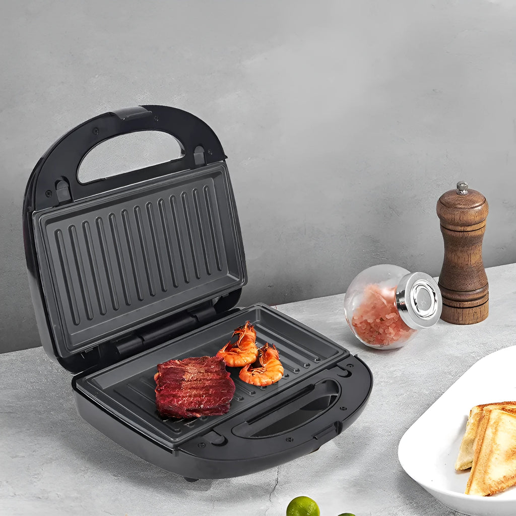 Black double-sided electric sandwich maker with non-stick plates and stainless steel lid
