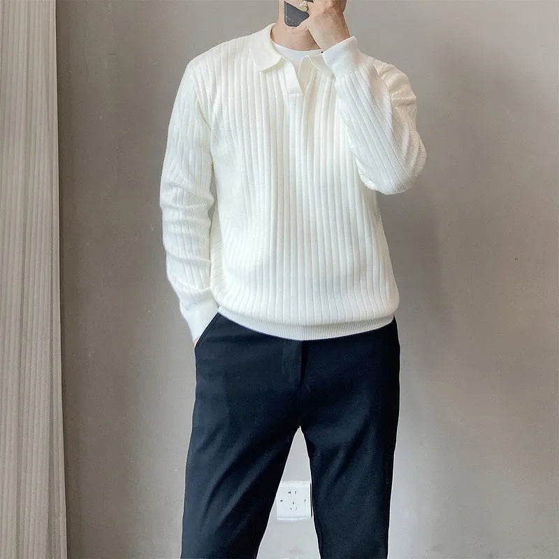 Man wearing a loose fit striped lapel pullover sweater in a rabbit fur and modal blend.