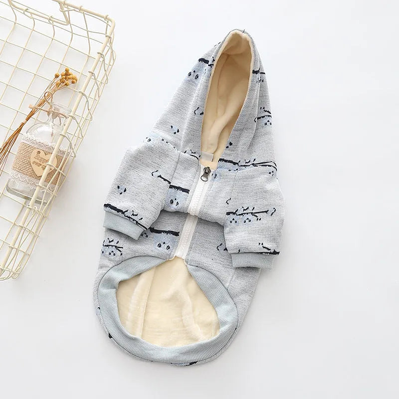 Blue cotton dog pattern sweater zipper coat on a small dog lying down