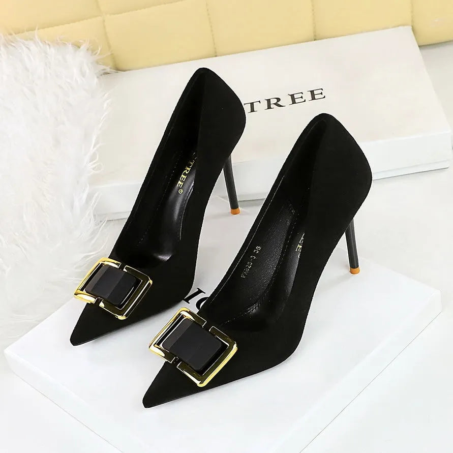 Black suede women's stiletto high heel shoes with a pointed toe and 9cm heel on a white background.
