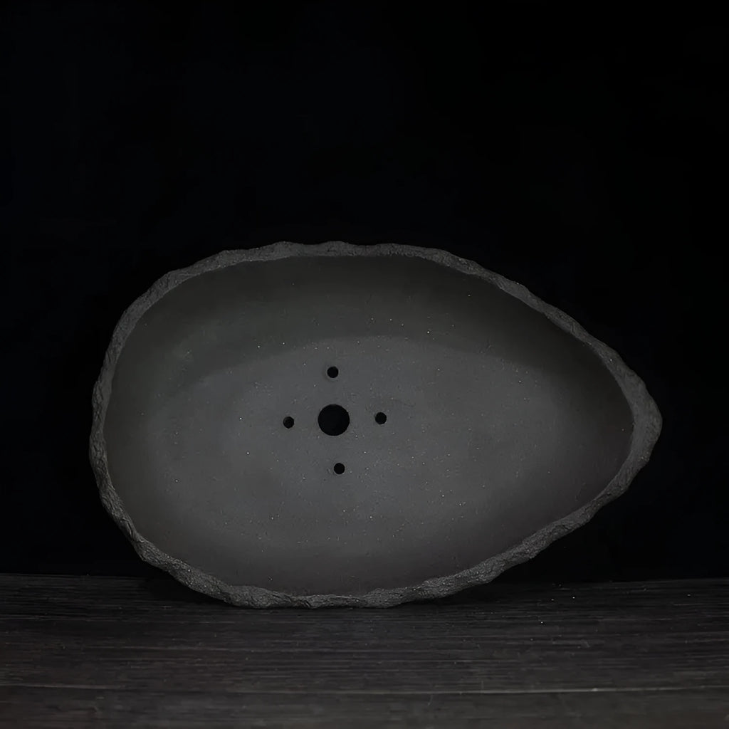 Handmade purple clay ceramic flower pot with drainage hole for floor-standing indoor plants