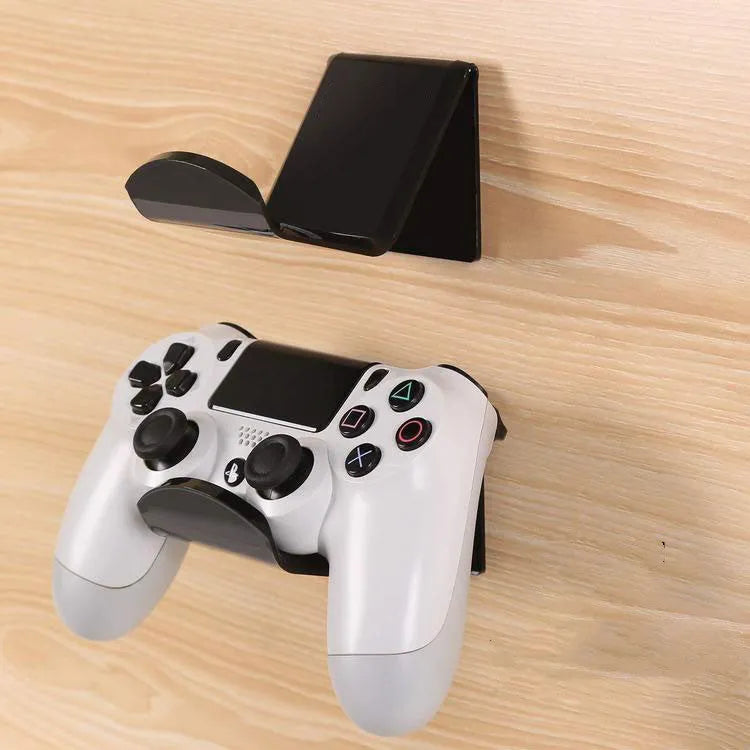 Universal game controller wall mount bracket shown in black, white, and transparent colours.