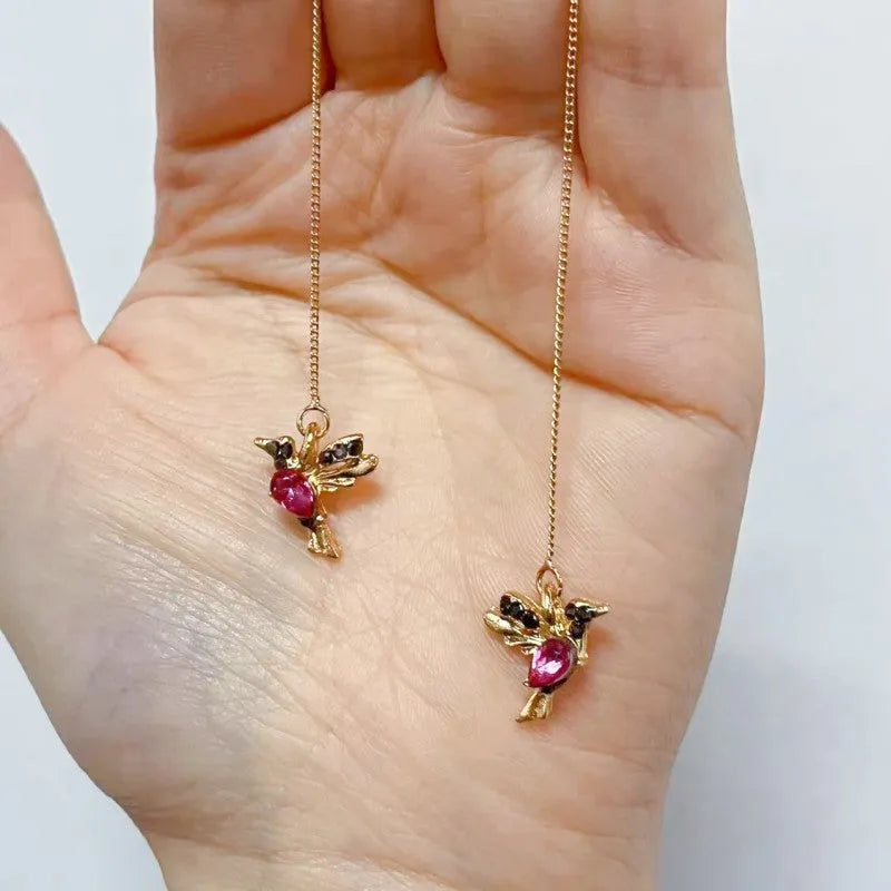Long hanging earrings with bird decoration featuring mixed zirconium wings on alloy chains
