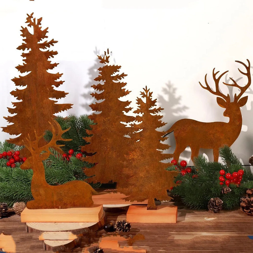Three rusty metal Christmas tree decorations with elk silhouette cutouts